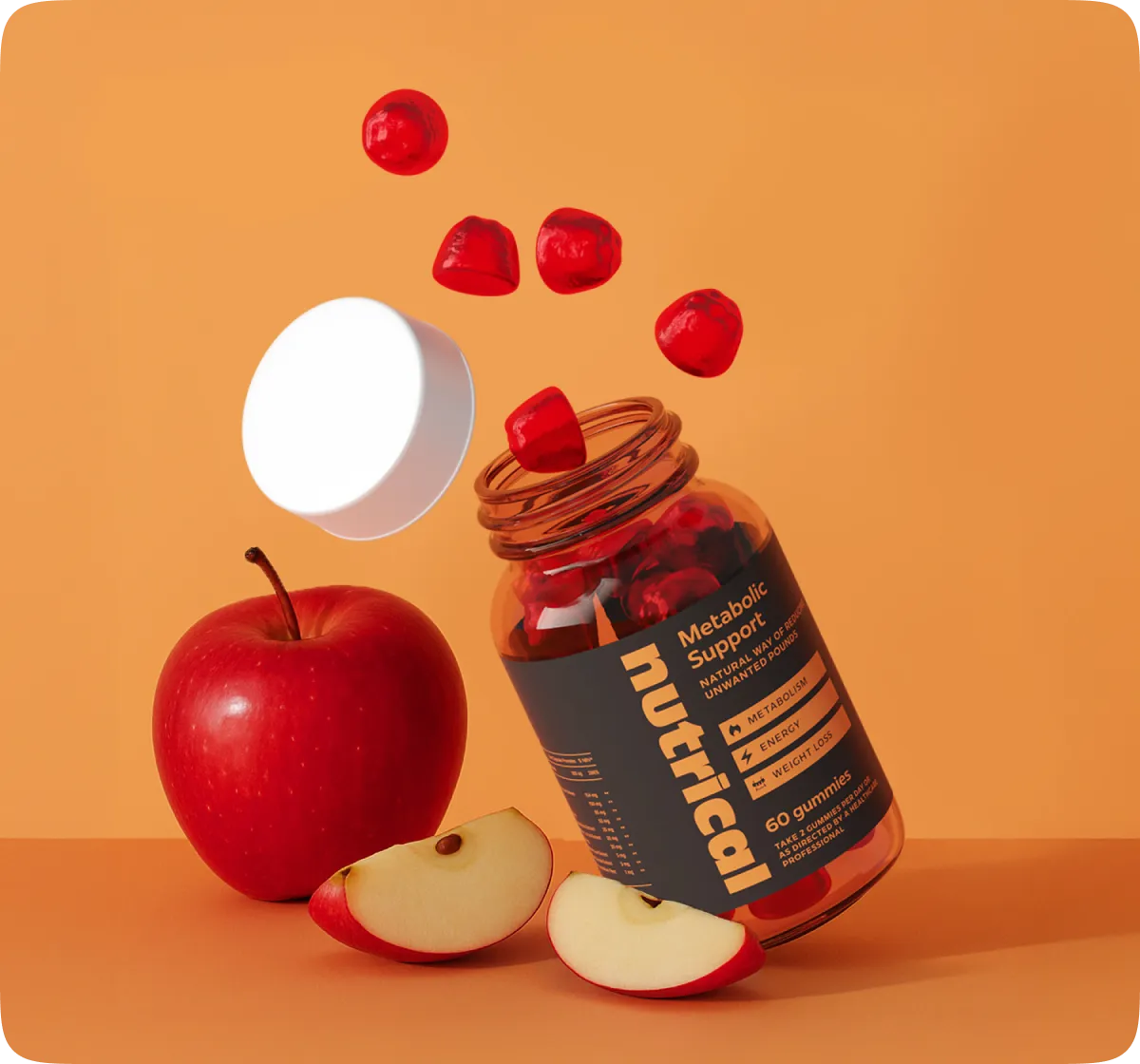 Bouteille de Nutrical à côté d'une pomme